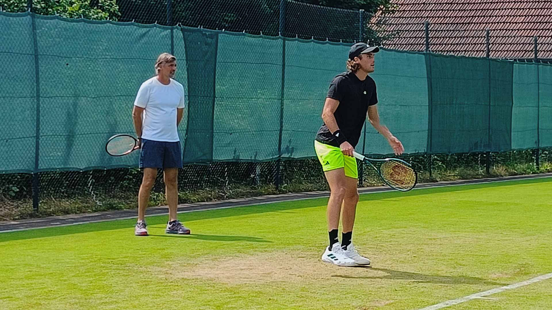 Goran Ivanisevic watches Stefanos Tsitsipas during practice on Saturday in Halle.