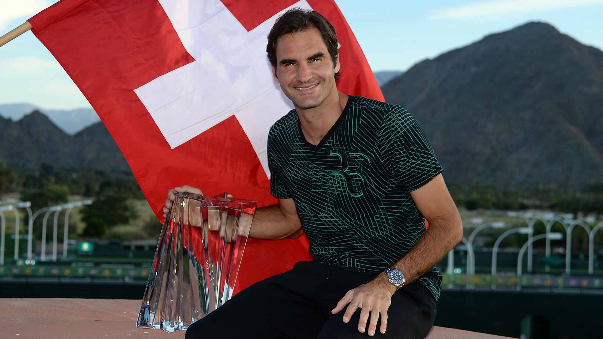 <a href='https://www.atptour.com/en/players/roger-federer/f324/overview'>Roger Federer</a> poses for a photo with his trophy after defeating fellow Swiss <a href='https://www.atptour.com/en/players/stan-wawrinka/w367/overview'>Stan Wawrinka</a> in the 2017 Indian Wells final