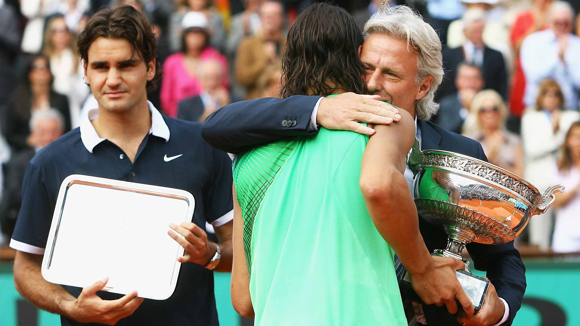 Nadal receives the French Open trophy from Bjorn Borg in 2008, his 4th title at Roland Garros