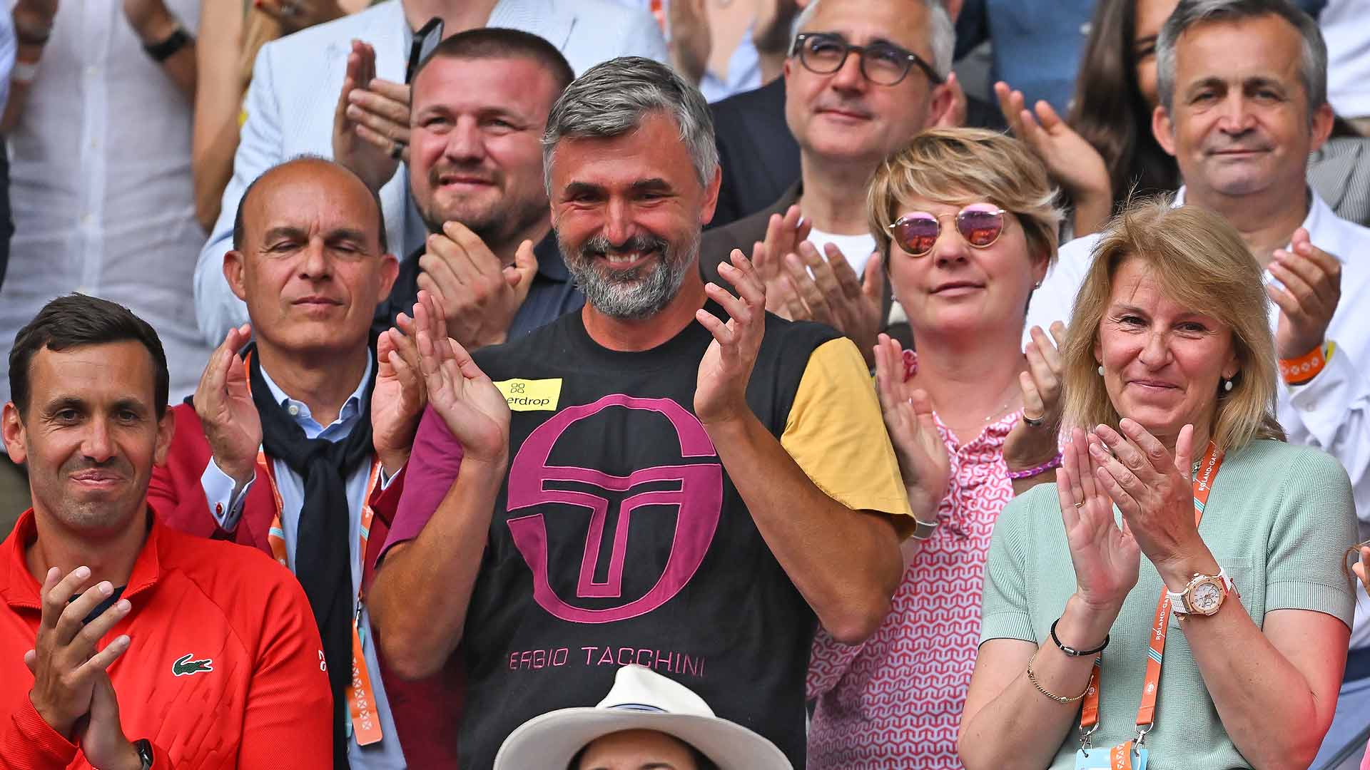 Goran Ivanisevic and the rest of Novak Djokovic's team celebrate the Serbian's Roland Garros triumph on Sunday.