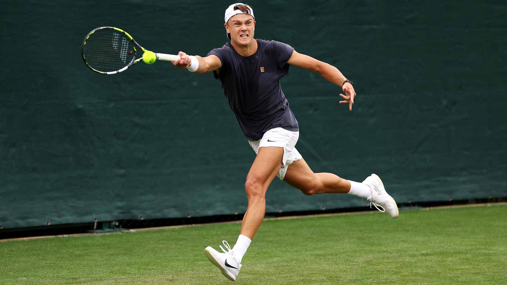 Holger Rune practised Tuesday at Wimbledon, where he will compete for the second time.