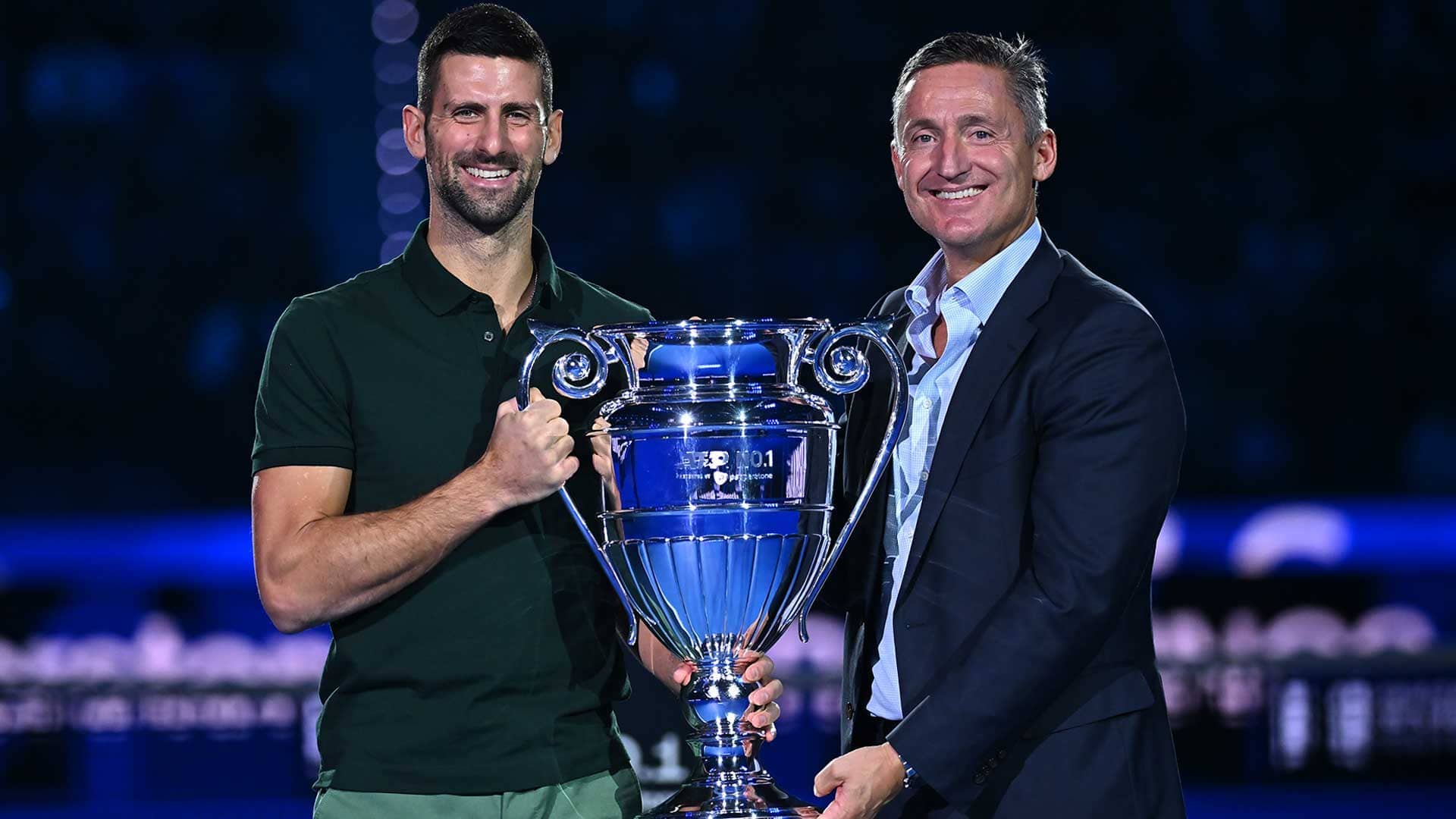 Novak Djokovic poses for a photo with ATP Chairman Andrea Gaudenzi to celebrate his 2023 ATP Year-End No. 1 presented by Pepperstone finish.