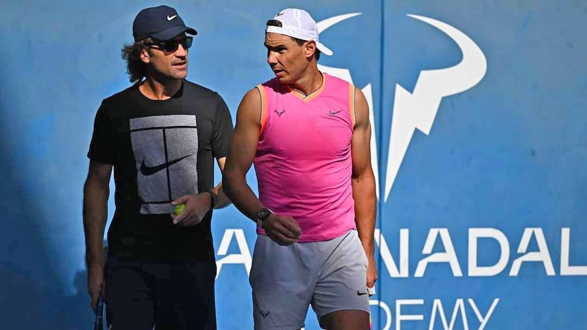 Carlos Moya and Rafael Nadal at practice in Kuwait.