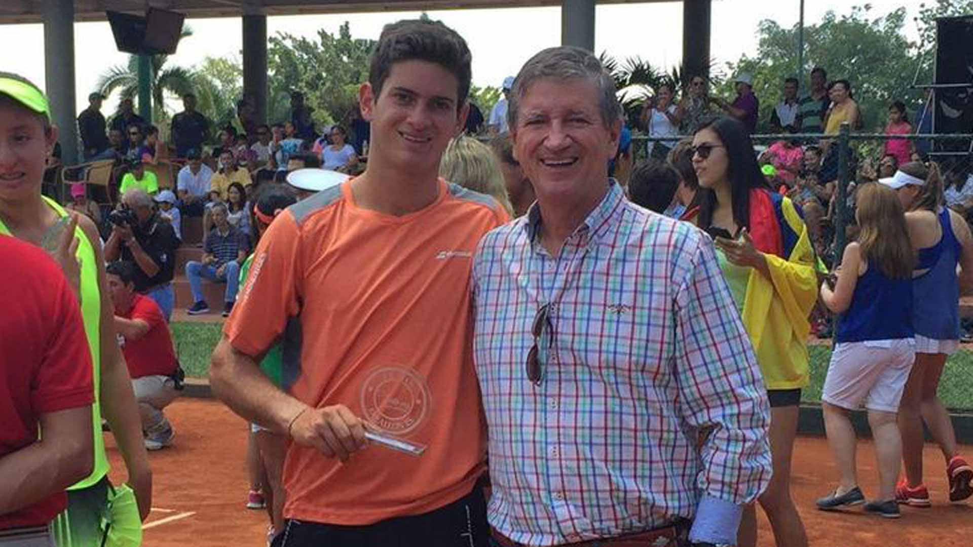 Nicolas Mejia at age 16 with his father Gustavo.