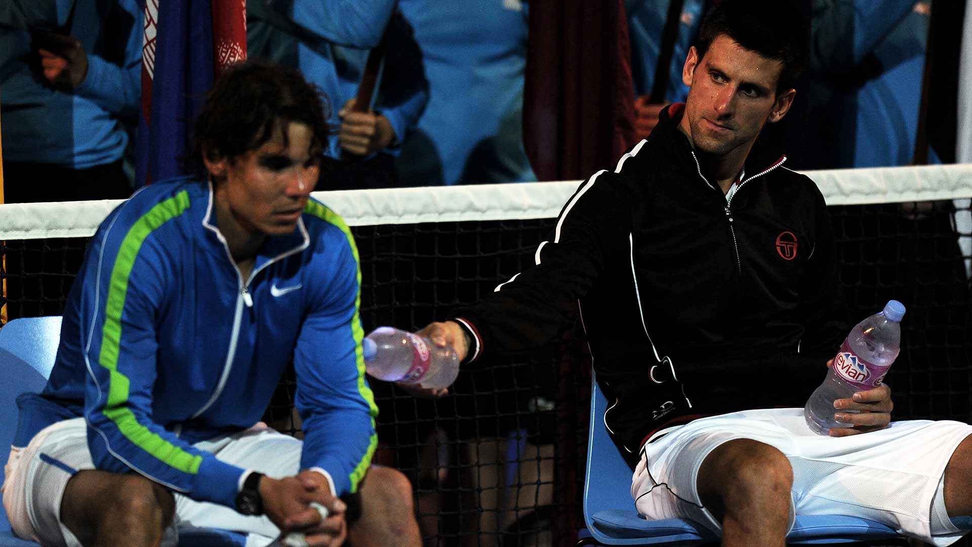 <a href='https://www.atptour.com/en/players/novak-djokovic/d643/overview'>Novak Djokovic</a> and <a href='https://www.atptour.com/en/players/rafael-nadal/n409/overview'>Rafael Nadal</a> take a seat during the trophy ceremony.