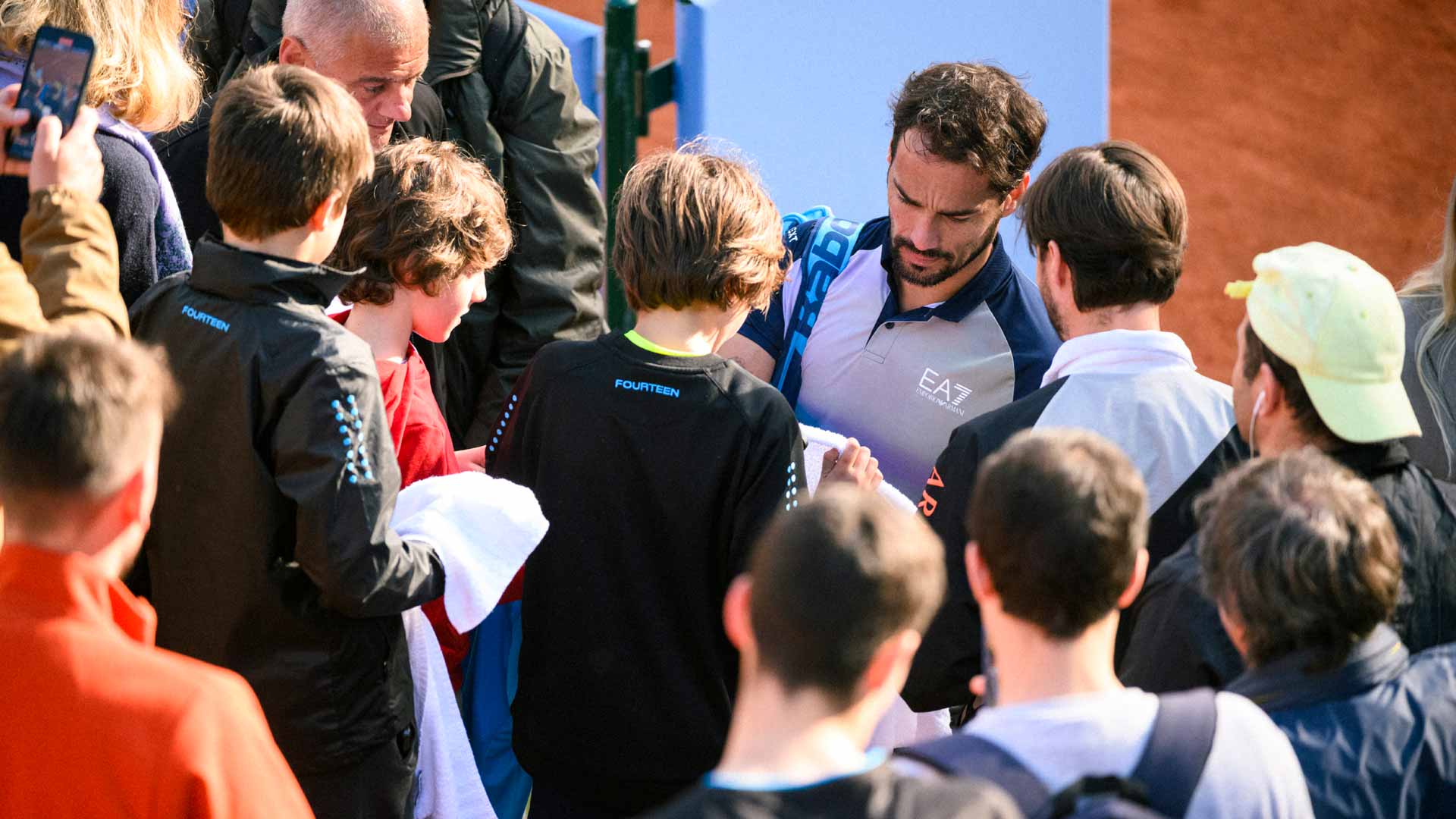<a href='https://www.atptour.com/en/players/fabio-fognini/f510/overview'>Fabio Fognini</a> greets fans following a first-round victory at the Turin Challenger.