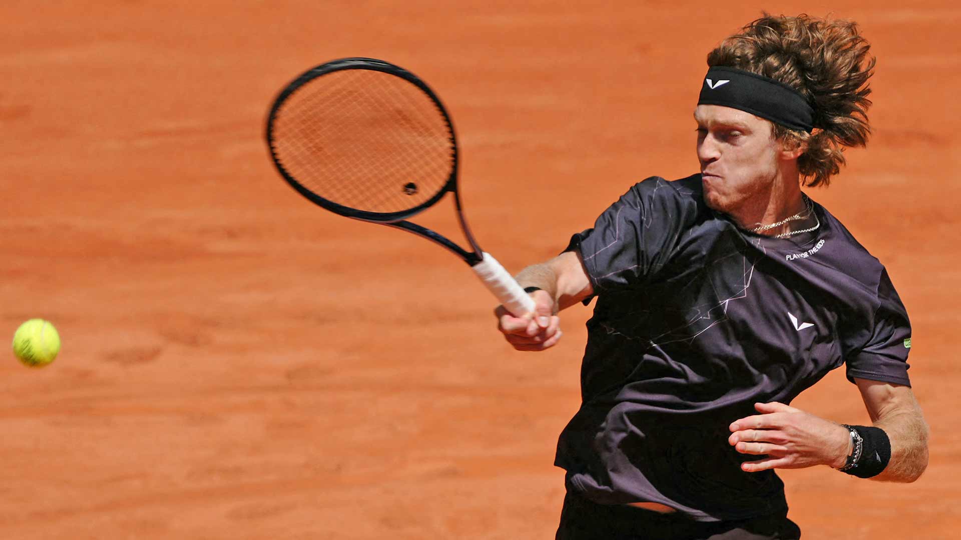 Andrey Rublev defeats Taro Daniel in four sets on Sunday at Roland Garros.