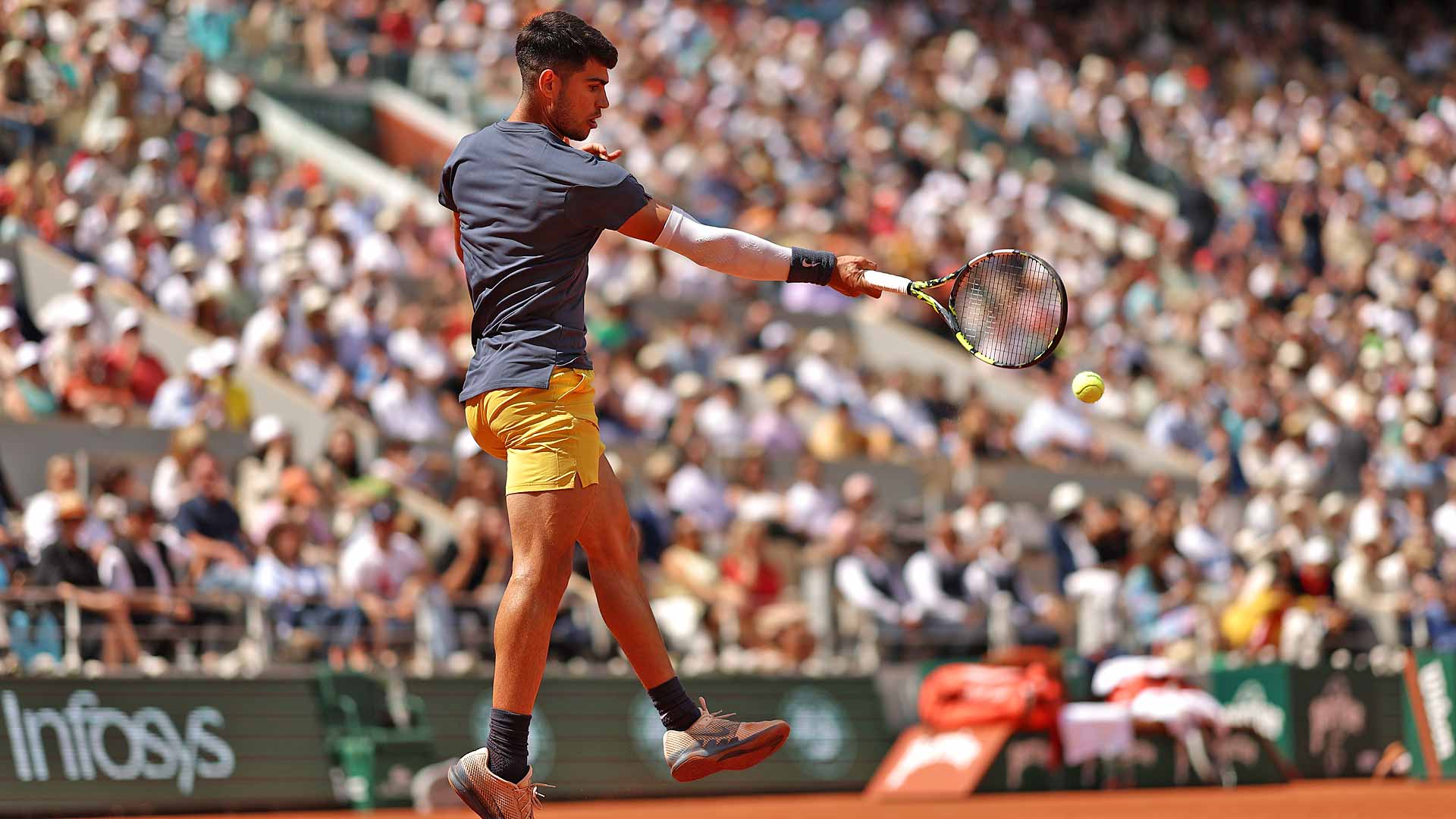 Carlos Alcaraz in action against J.J. Wolf on Sunday at Roland Garros.