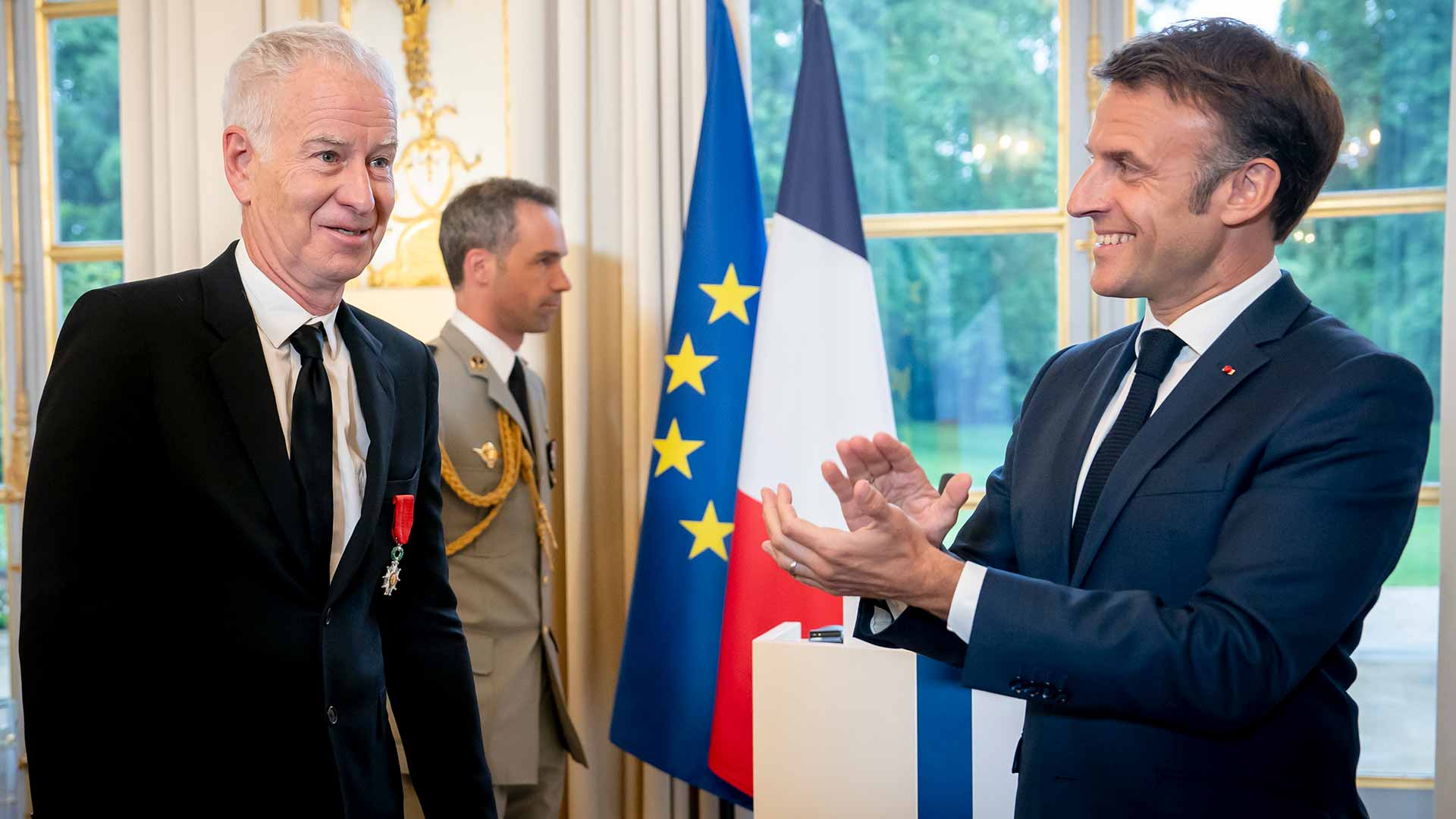 John McEnroe receives French Legion of Honour award from President Emmanuel Macron on Wednesday.