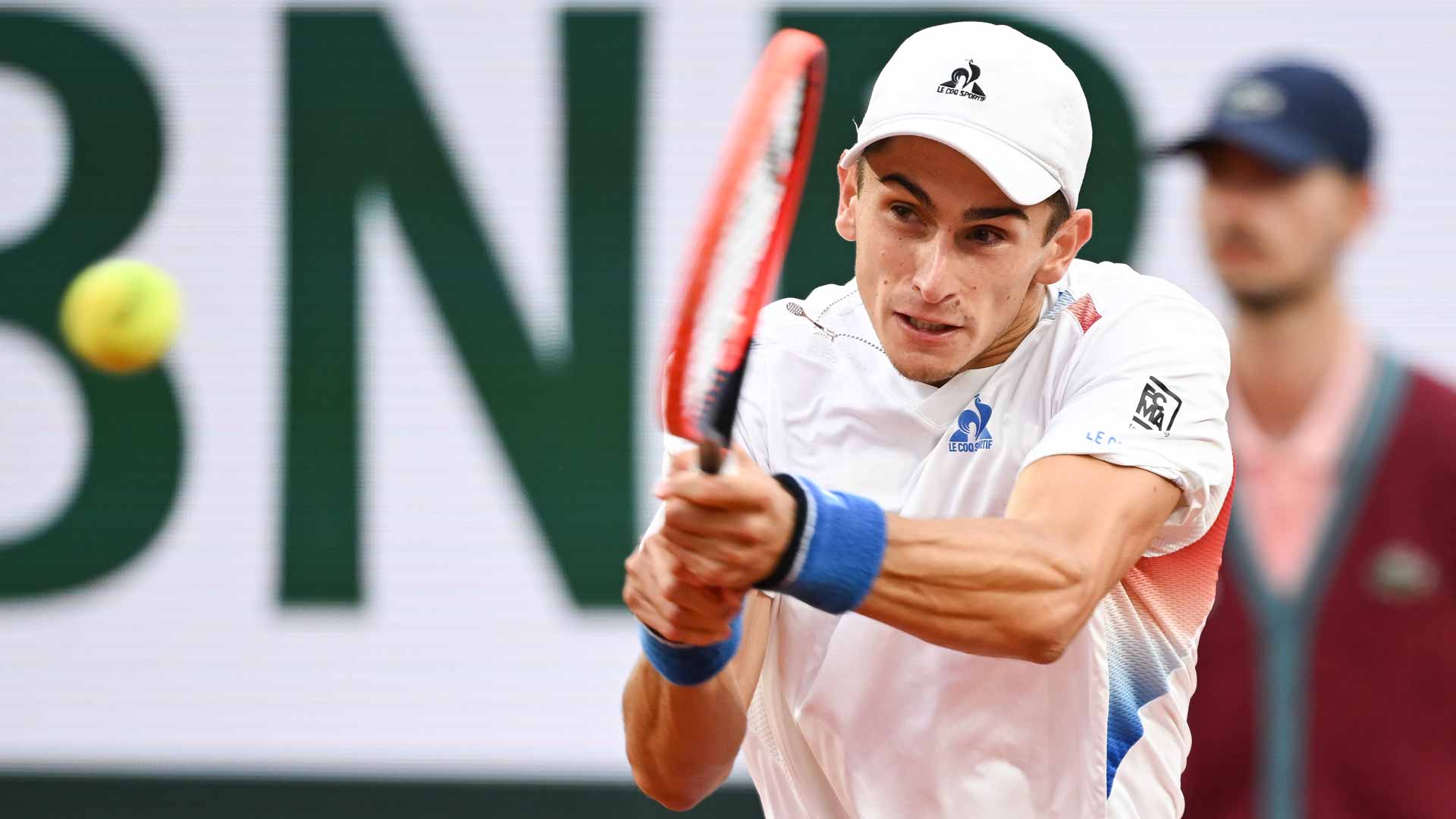 Matteo Arnaldi defeats Andrey Rublev in straight sets Friday at Roland Garros.