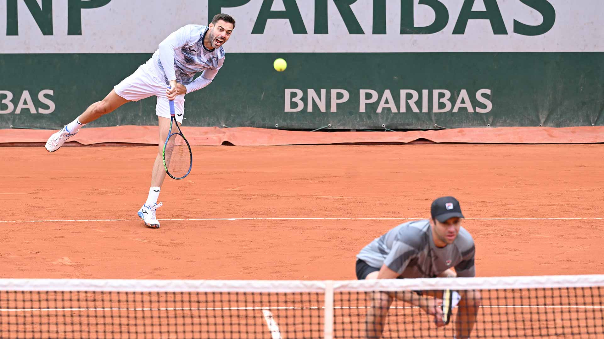 Marcel Granollers and Horacio Zeballos in action in Paris on Saturday.