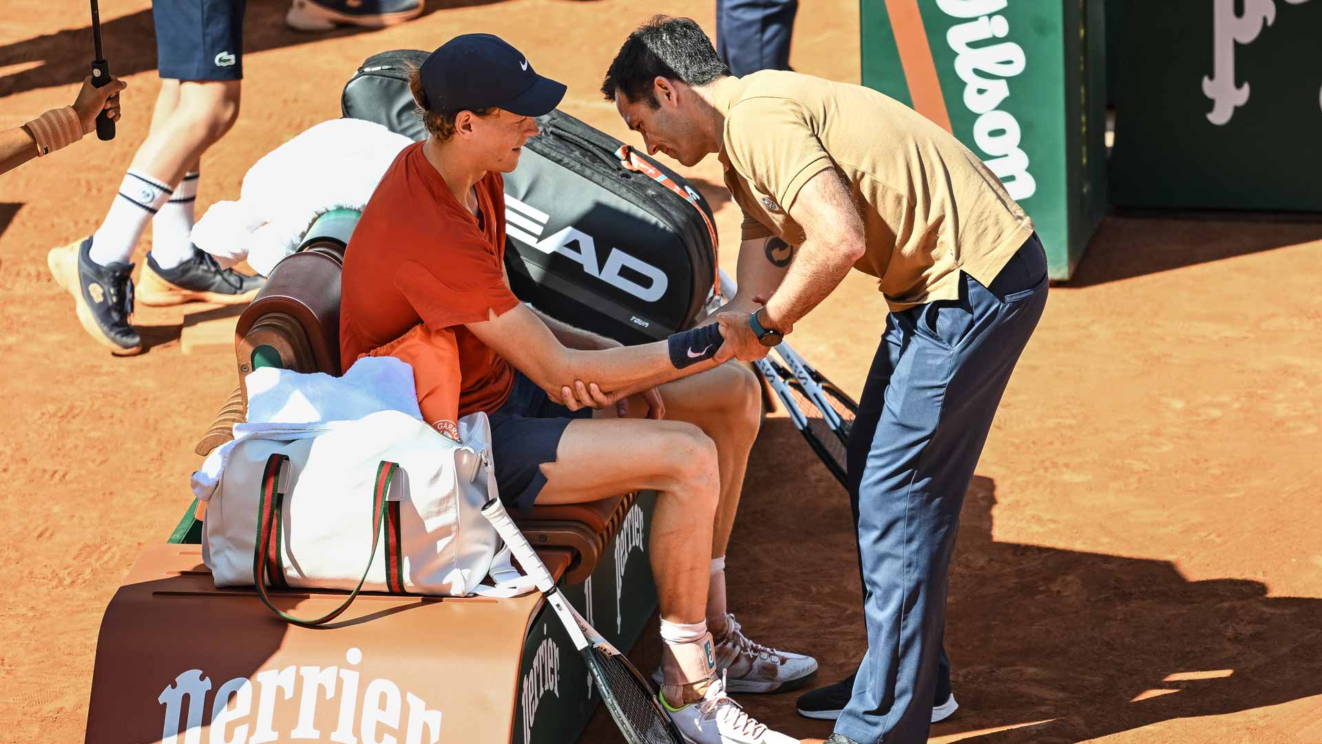 <a href='https://www.atptour.com/en/players/jannik-sinner/s0ag/overview'>Jannik Sinner</a> receives treatment during his <a href='https://www.atptour.com/en/tournaments/roland-garros/520/overview'>Roland Garros</a> semi-final against <a href='https://www.atptour.com/en/players/carlos-alcaraz/a0e2/overview'>Carlos Alcaraz</a>.