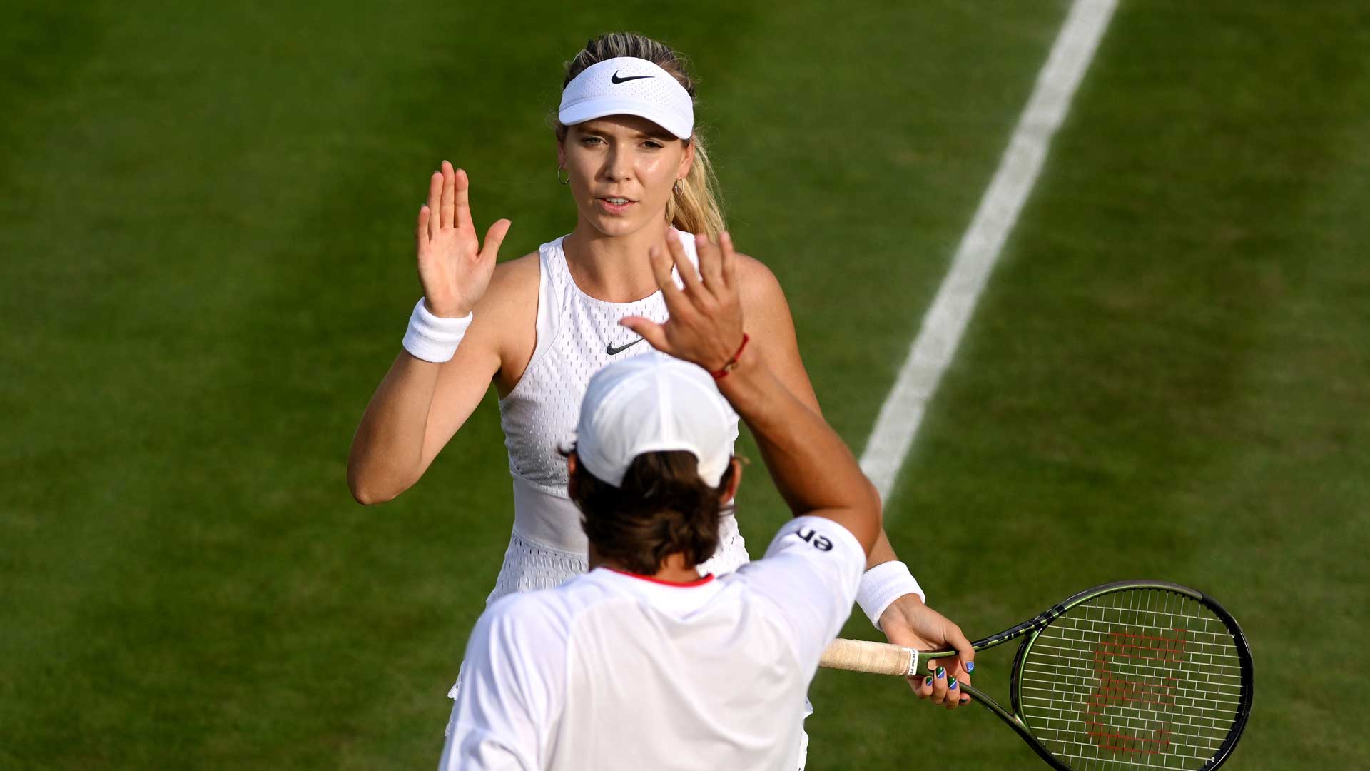 Katie Boulter and Alex de Minaur played mixed doubles at Wimbledon in 2023.