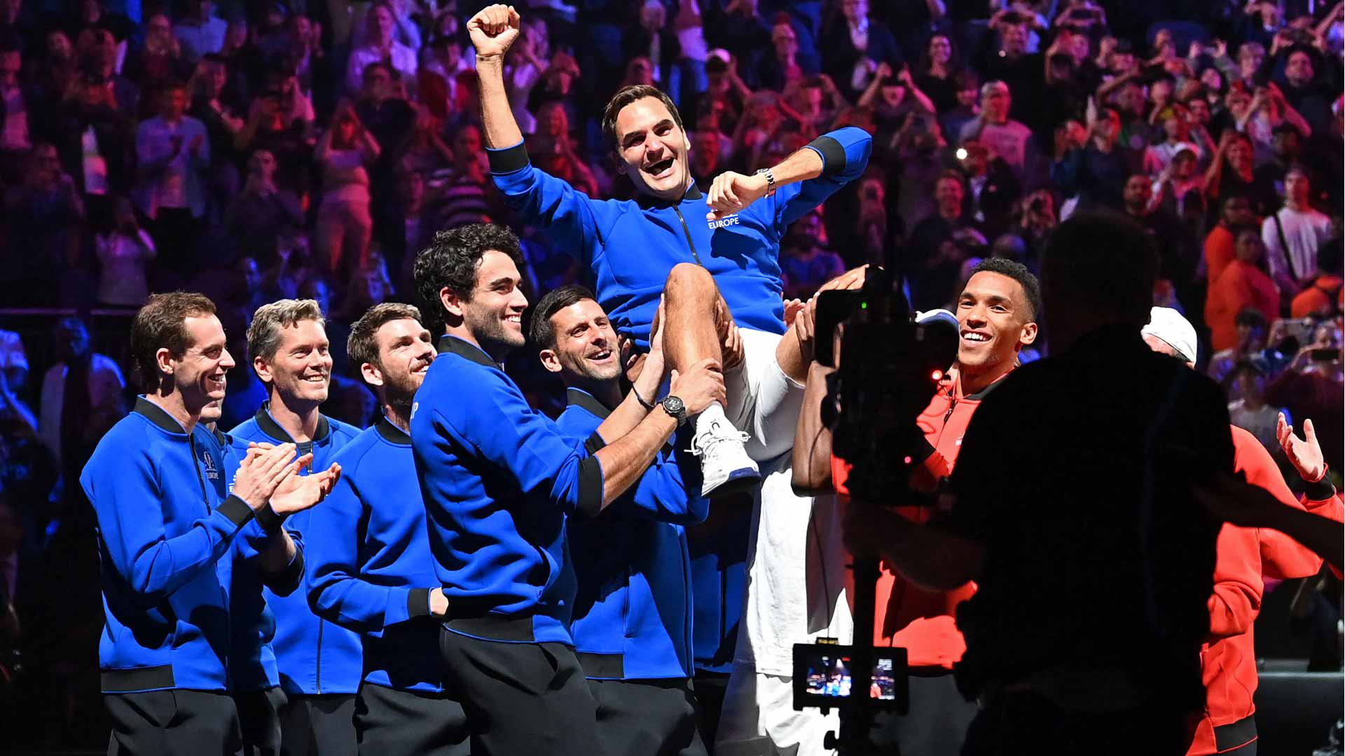 Roger Federer is hoisted into the air by fellow competitors at the 2022 Laver Cup.