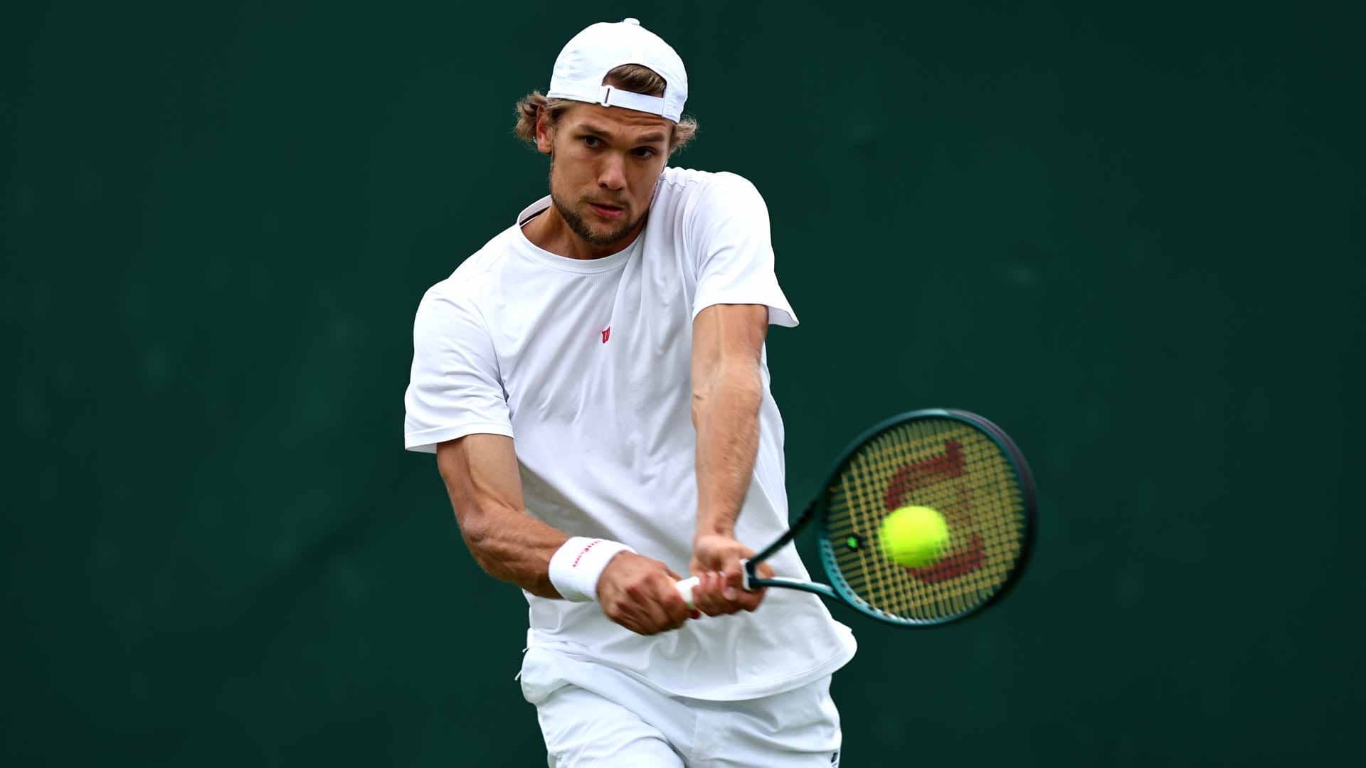 Otto Virtanen defeats Max Purcell at Wimbledon Monday to win his first main draw match at a Grand Slam tournament.