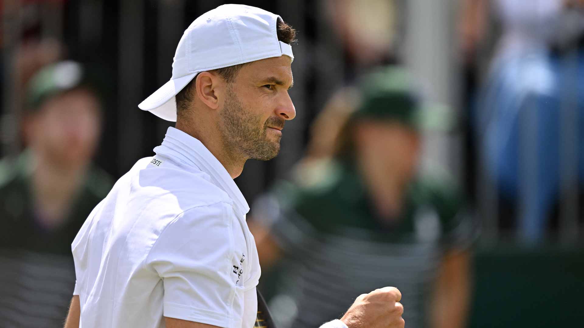 Grigor Dimitrov rallies from two sets down Thursday against Shang Juncheng at Wimbledon.