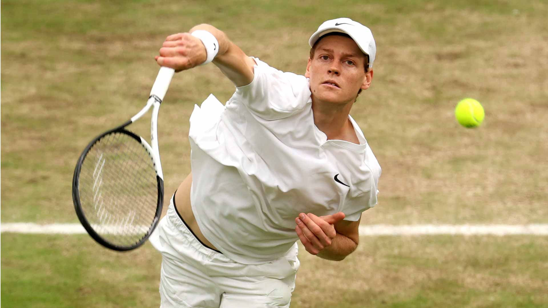 Jannik Sinner defeats Ben Shelton in straight sets Sunday at Wimbledon.