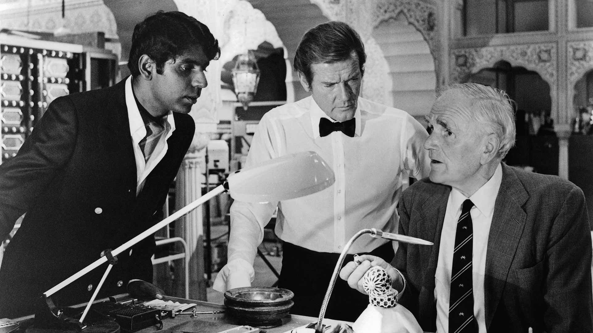 Vijay Amritraj acting in the James Bond film Octopussy alongside Roger Moore and Desmond Llewelyn.