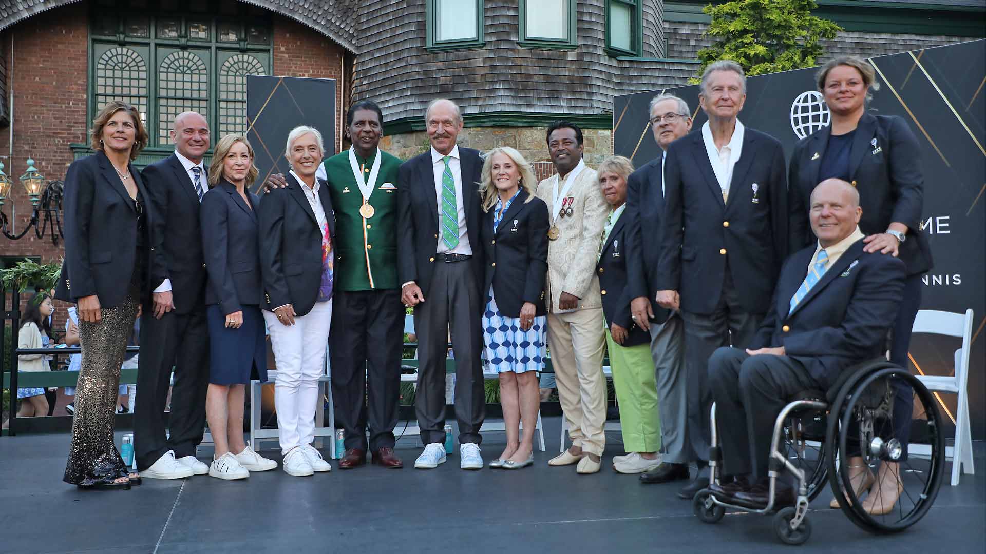 International Tennis Hall of Famers pose after Saturday evening's induction ceremony in Newport.