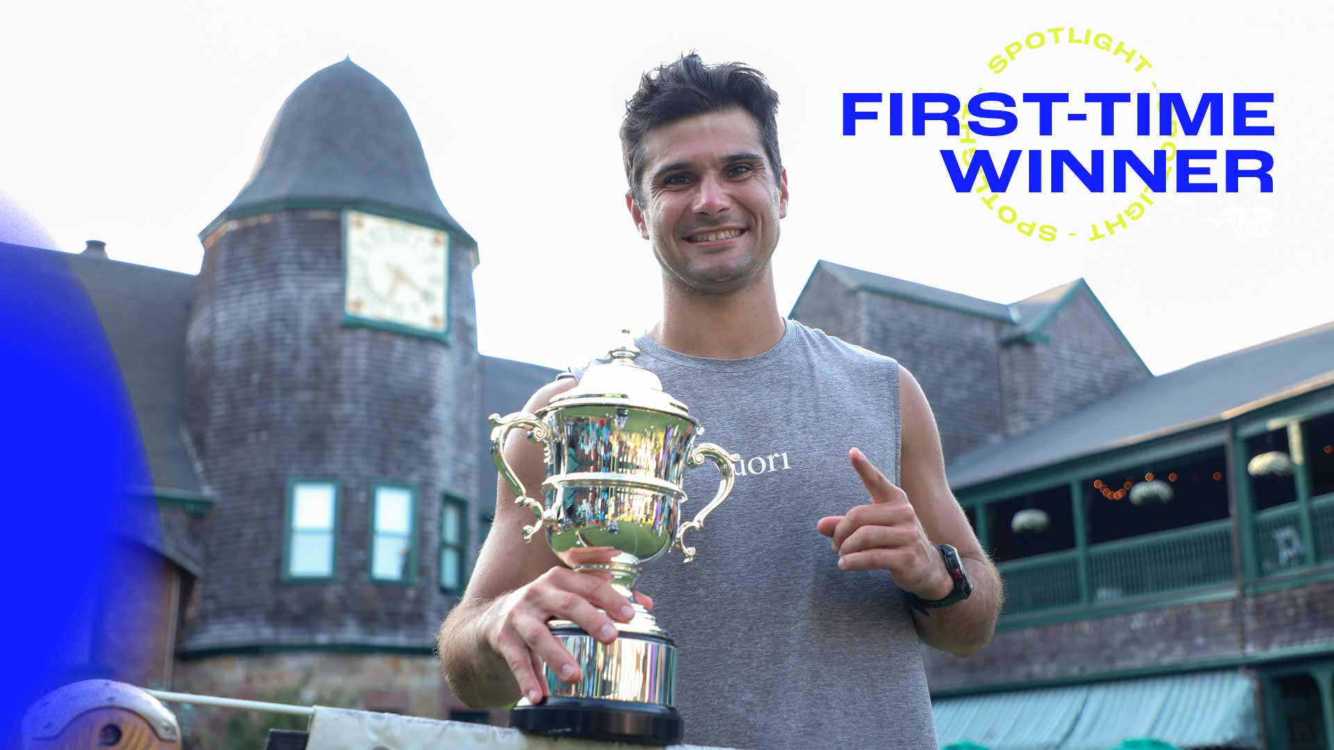 Marcos Giron celebrates his first ATP Tour title at the International Tennis Hall of Fame.