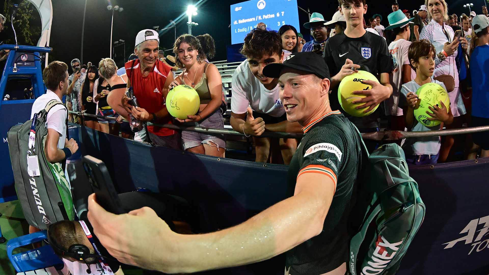Harri Heliovaara interacts with fans after partnering Henry Patten to a first-round victory on Monday in Washington.