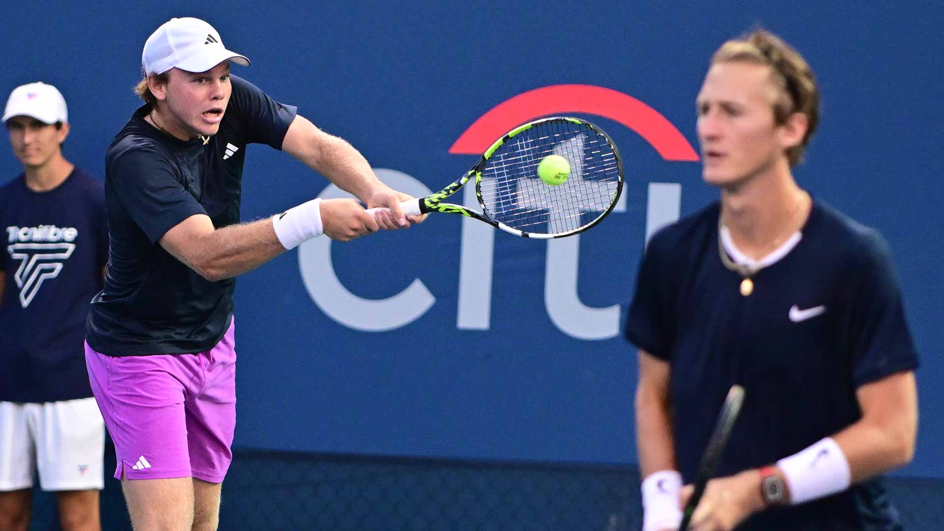 Alex Michelsen and Sebastian Korda cruise to a 47-minute victory Wednesday in Washington.