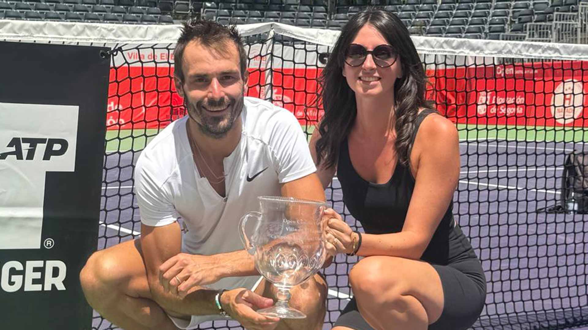 Antoine Escoffier and his wife Yolhen celebrate the Frenchman's first Challenger title.