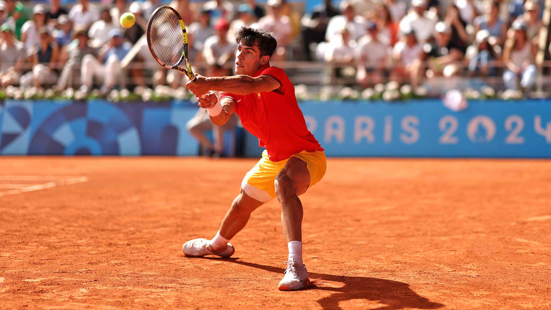 Carlos Alcaraz in action against Novak Djokovic on Sunday during the Paris Olympics gold-medal match.