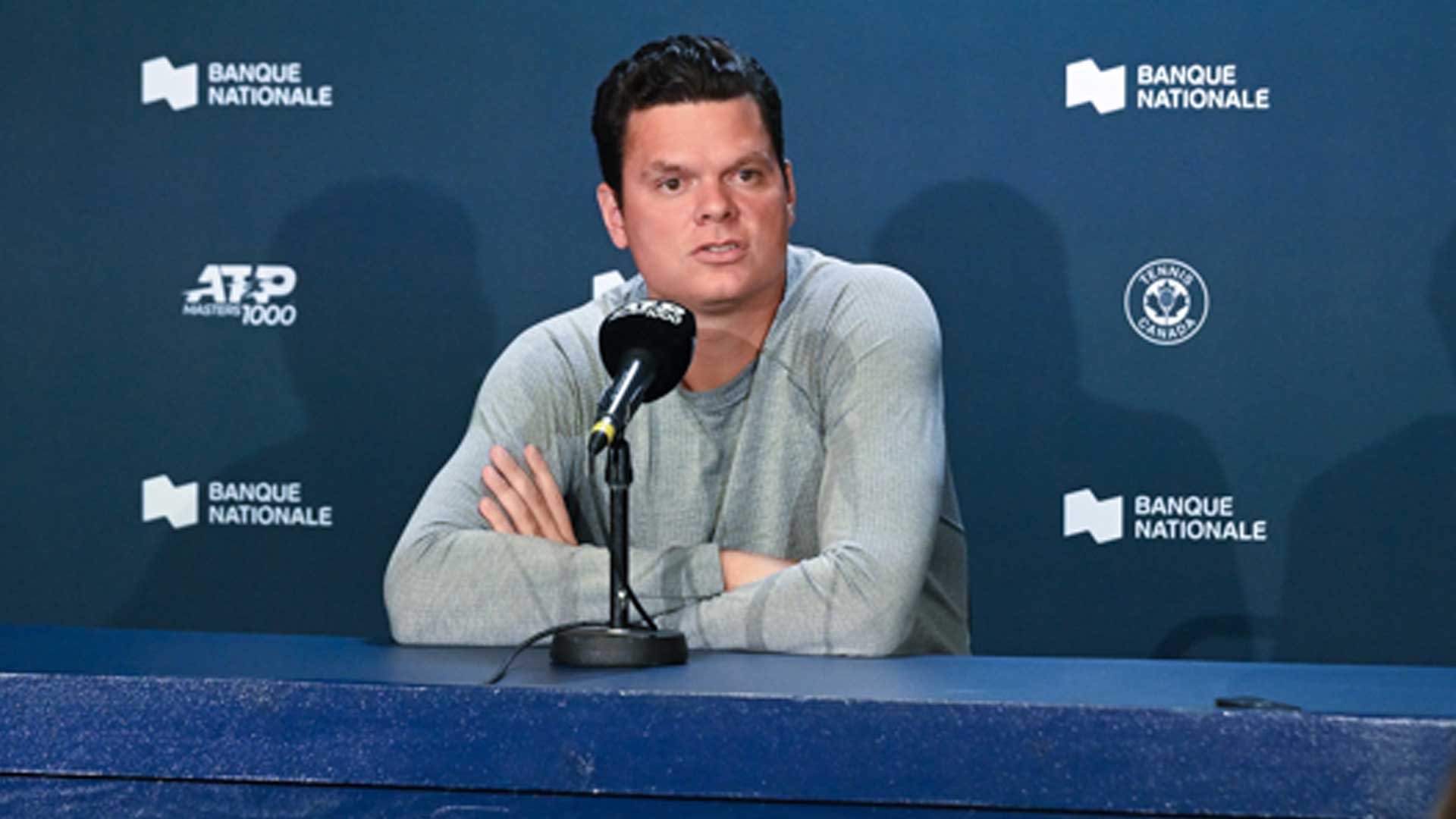 Milos Raonic speaks to the media Tuesday evening to announce his withdrawal.