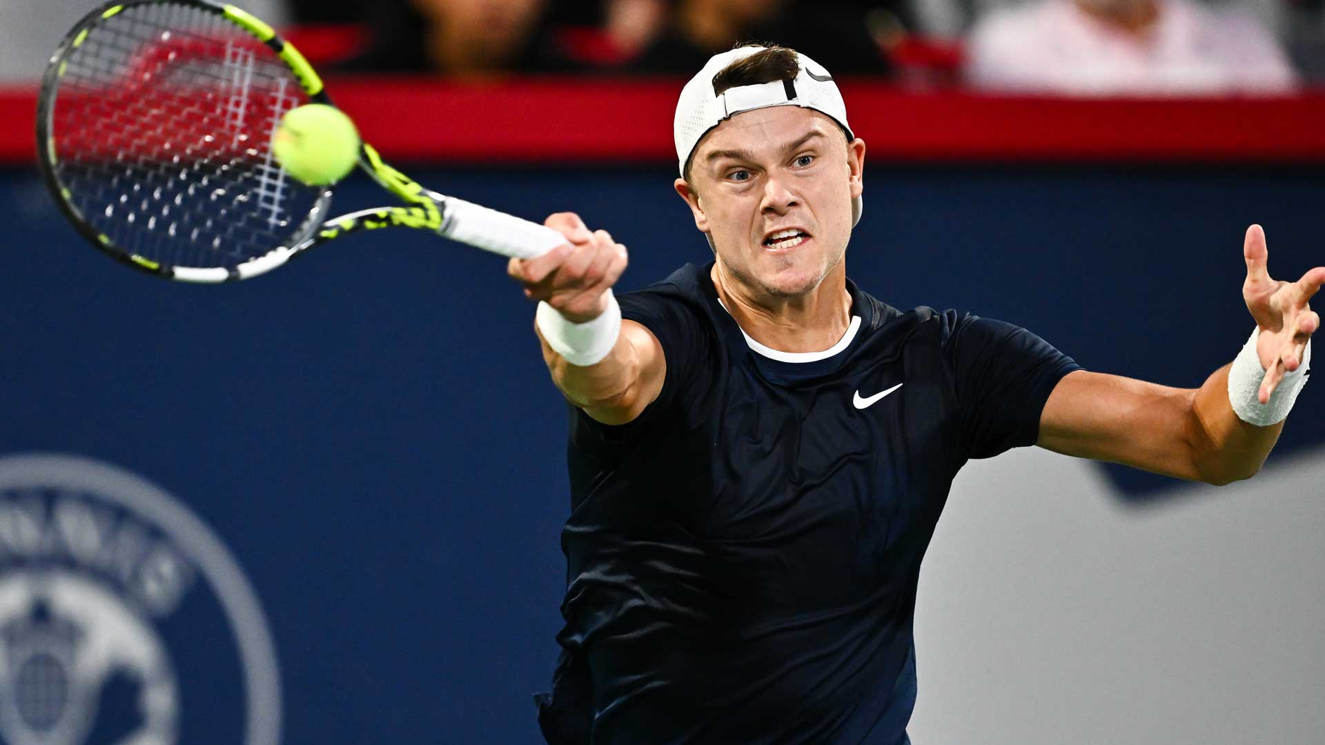 Holger Rune defeats Roberto Bautista Agut in three sets on Tuesday in Montreal.