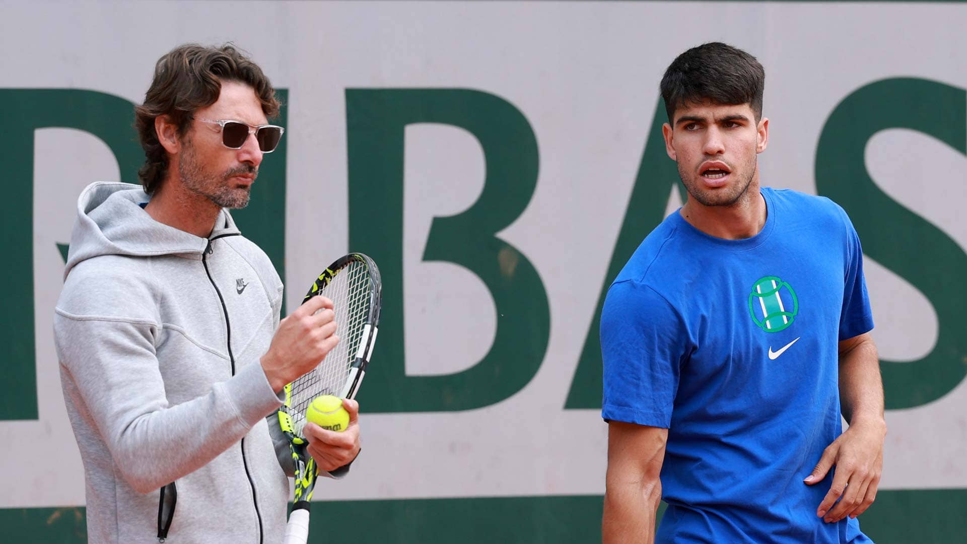 Juan Carlos Ferrero and Carlos Alcaraz hit the practice court at Roland Garros.