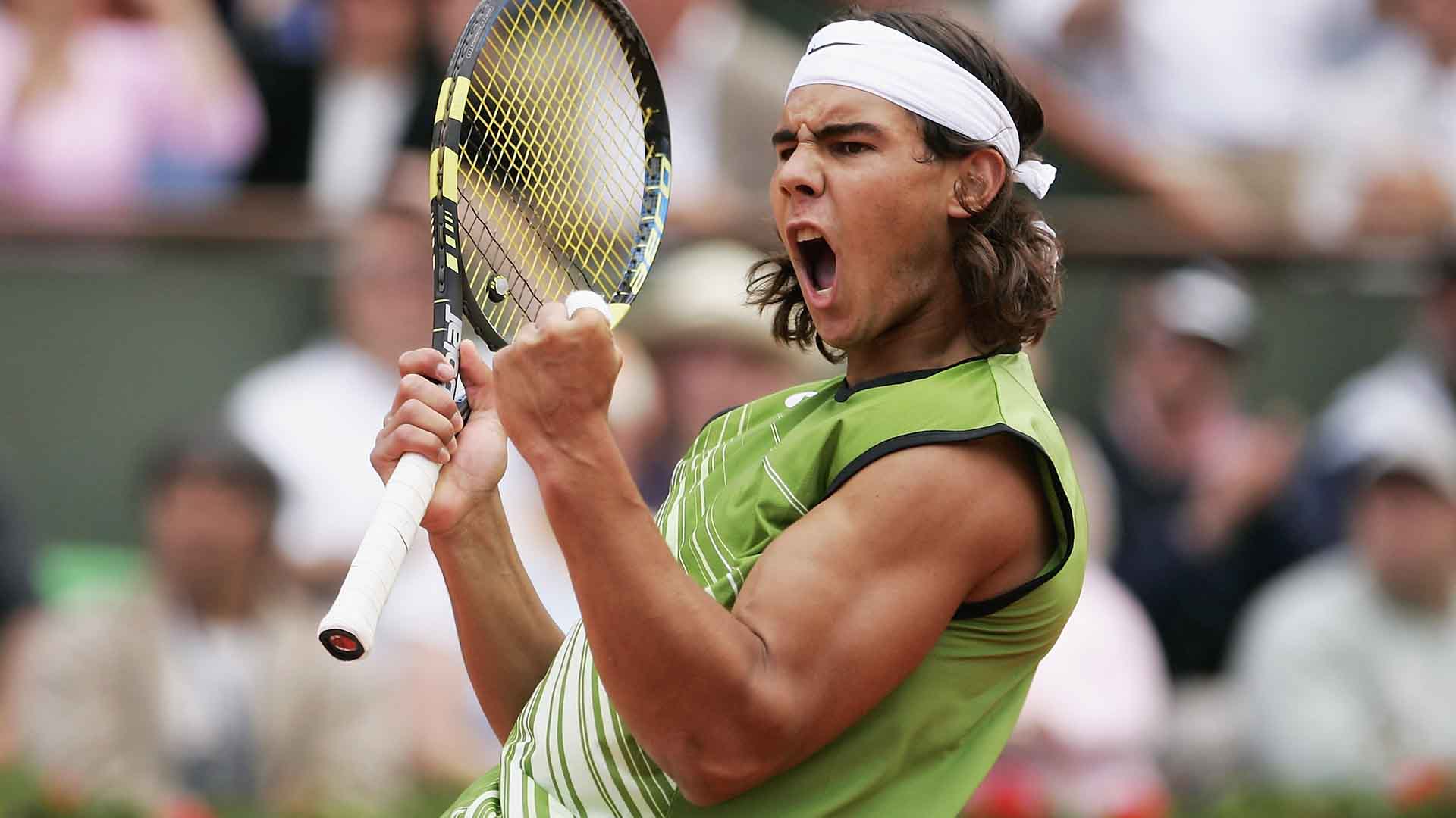 <a href='https://www.atptour.com/en/players/rafael-nadal/n409/overview'>Rafael Nadal</a> defeats <a href='https://www.atptour.com/en/players/mariano-puerta/p372/overview'>Mariano Puerta</a> of Argentina 6-7(6), 6-3, 6-1, 7-5 to win his first Grand Slam title at <a href='https://www.atptour.com/en/tournaments/roland-garros/520/overview'>Roland Garros</a> in 2005.
